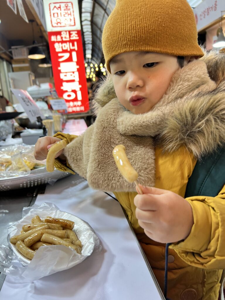 Photo of a child eating Ddukbokki